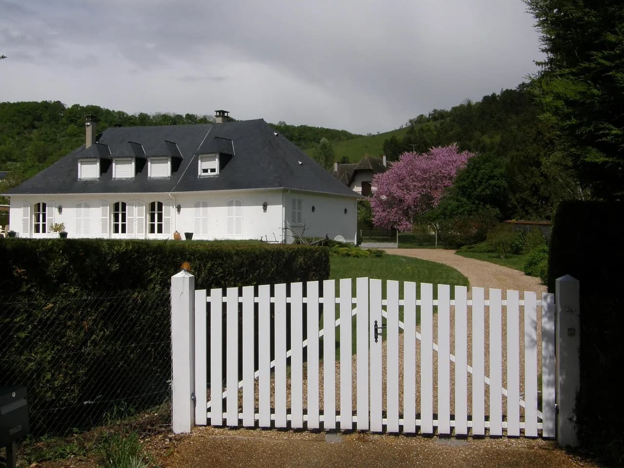 Suburban residential backyard fence — wood and vinyl privacy fencing — Fenced.ca